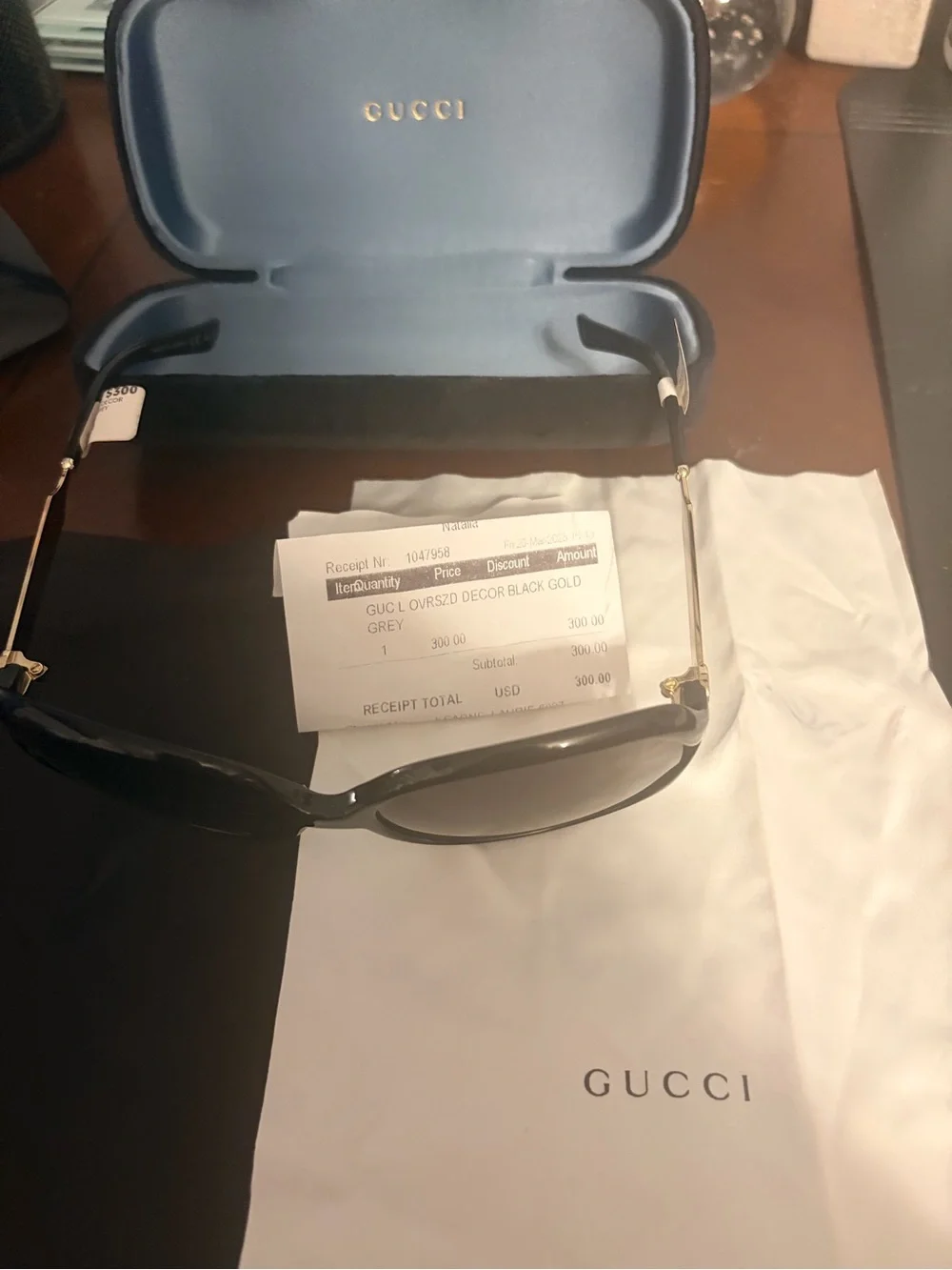 Gucci Women's Black Frame Sunglasses with Dark Gradient Lenses